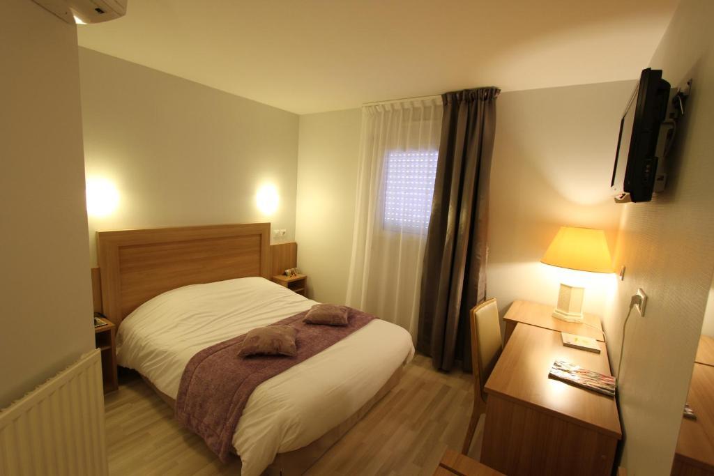 Logis Hotel Restaurant Le Grand Turc LʼOie Quarto foto